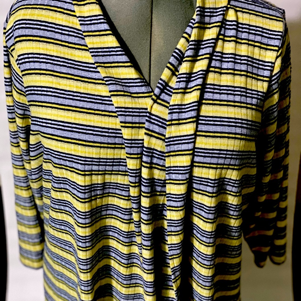 Metallic yellow and blue sweater top.